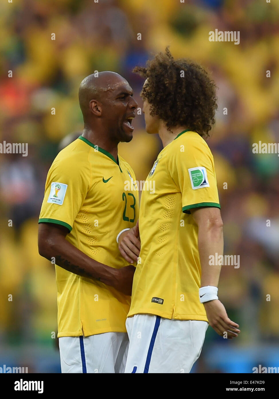 Fortaleza, Brazil. 4th July, 2014. Brazil's Maicon (L) and David Luiz celebrate a goal by Thiago Silva during a quarter-finals match between Brazil and Colombia of 2014 FIFA World Cup at the Estadio Castelao Stadium in Fortaleza, Brazil, on July 4, 2014. Credit:  Li Ga/Xinhua/Alamy Live News Stock Photo