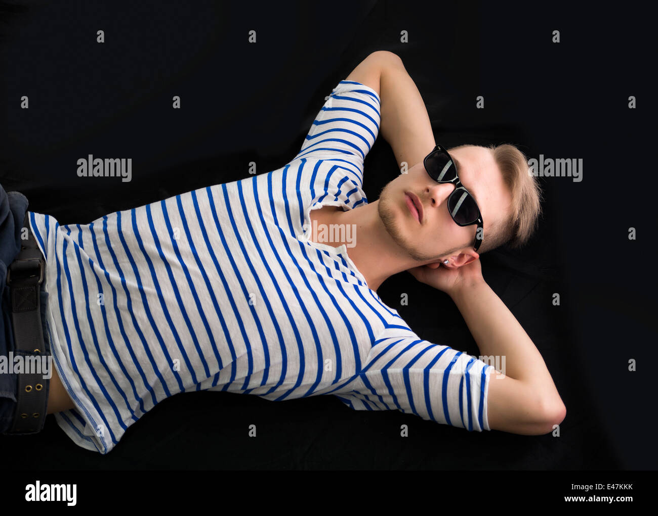 Serious blond man sunglasses hi-res stock photography and images - Alamy