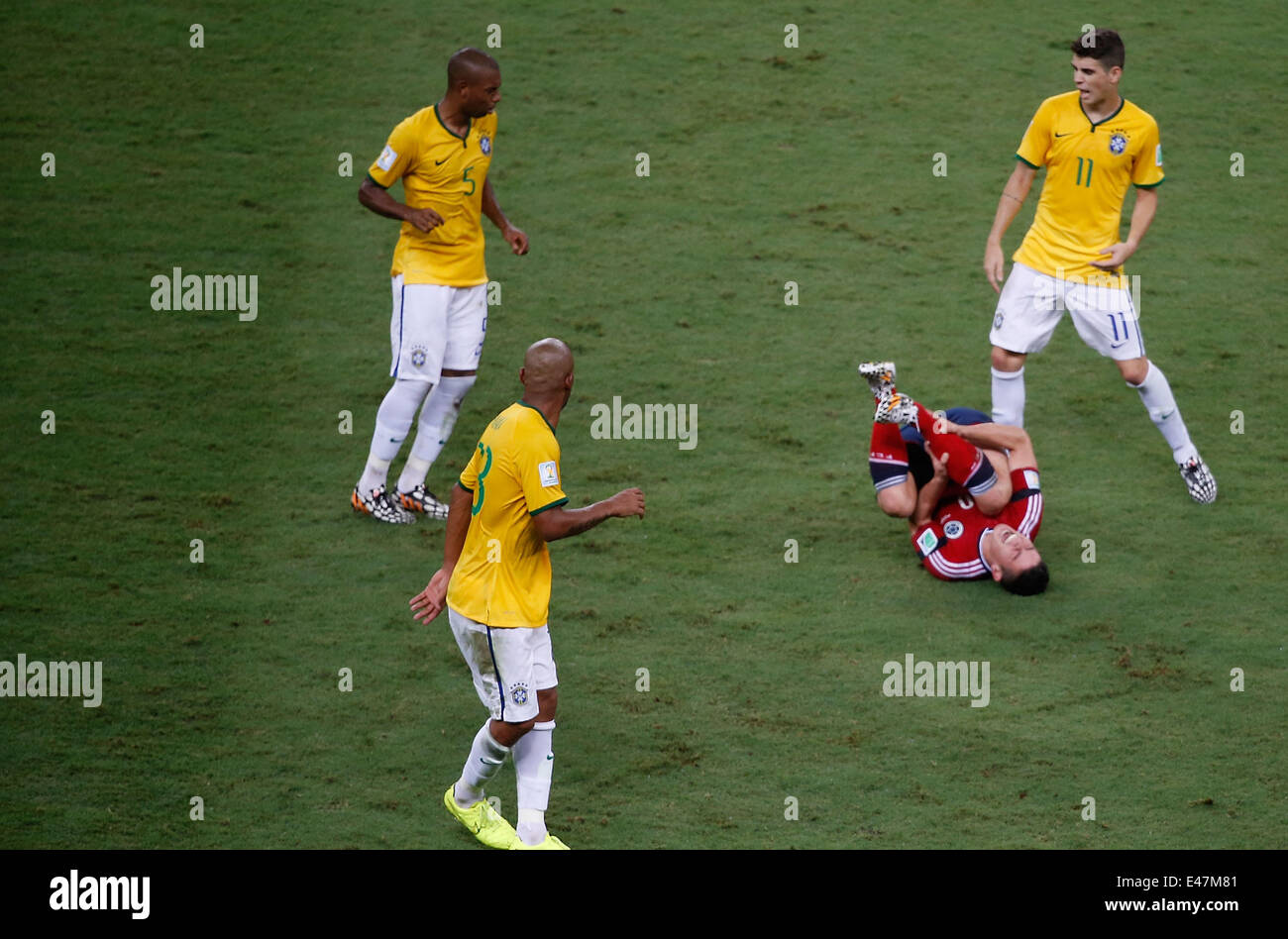 Fortaleza, Brazil. 4th July, 2014. Colombia's James Rodriguez falls down during a quarter-finals match between Brazil and Colombia of 2014 FIFA World Cup at the Estadio Castelao Stadium in Fortaleza, Brazil, on July 4, 2014. Credit:  Liao Yujie/Xinhua/Alamy Live News Stock Photo