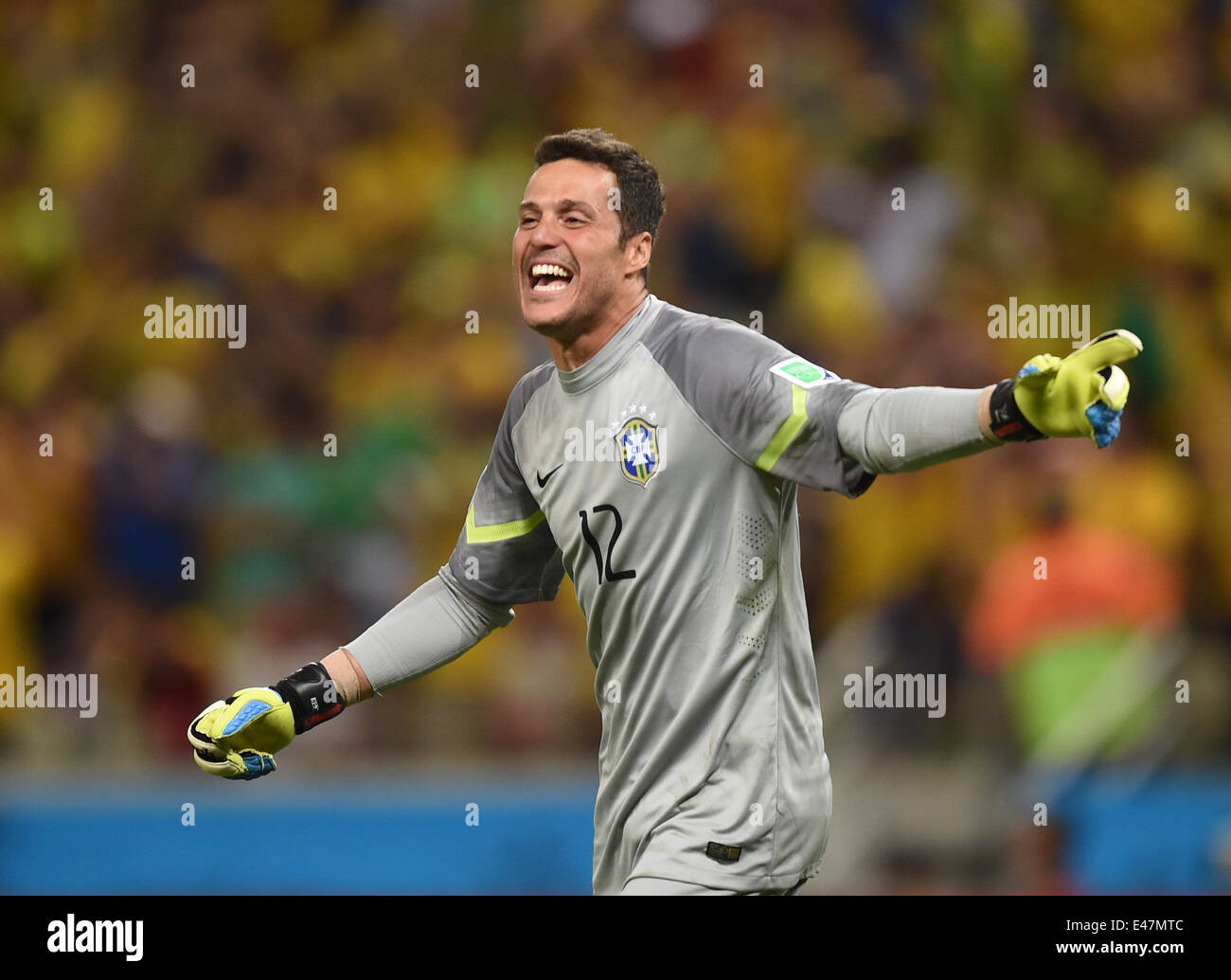 Fortaleza, Brazil. 04th July, 2014. Goalkeeper Julio Cesar of Brazil celebrates during the FIFA World Cup 2014 quarter final match soccer between Brazil and Colombia at the Estadio Castelao in Fortaleza, Brazil, 04 July 2014. Photo: Marius Becker/dpa/Alamy Live News Stock Photo