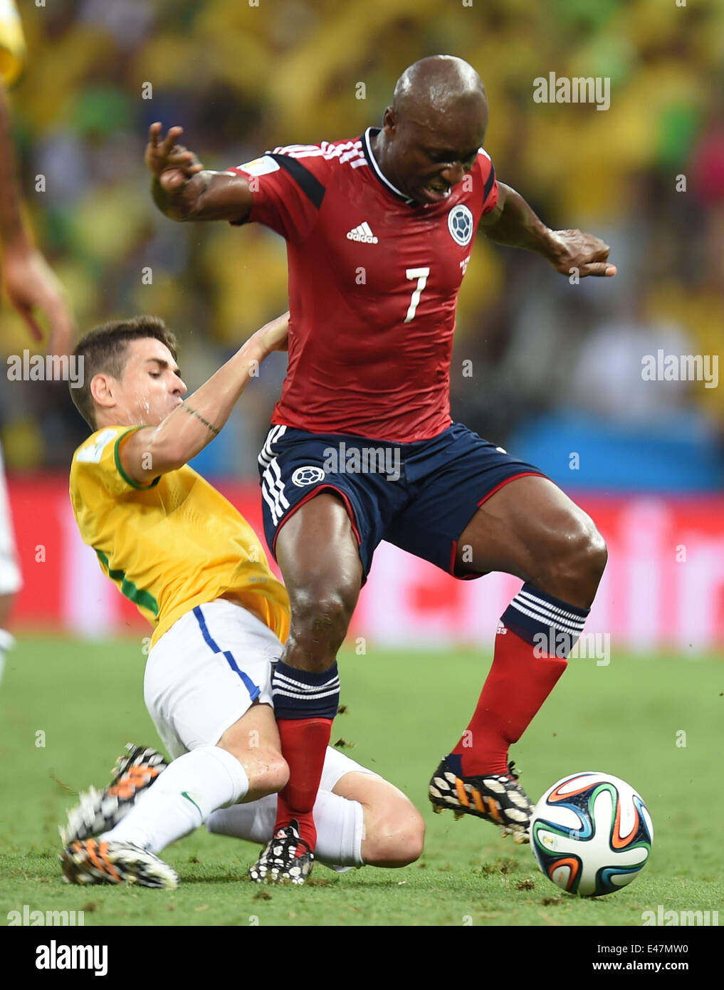 Fortaleza, Brazil. 4th July, 2014. Colombia's Pablo Armero (front) competes during a quarter-finals match between Brazil and Colombia of 2014 FIFA World Cup at the Estadio Castelao Stadium in Fortaleza, Brazil, on July 4, 2014. Credit:  Li Ga/Xinhua/Alamy Live News Stock Photo