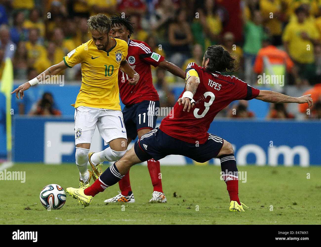 Fortaleza, Brazil. 4th July, 2014. Brazil's Neymar vies with Colombia's Mario Yepes during a quarter-finals match between Brazil and Colombia of 2014 FIFA World Cup at the Estadio Castelao Stadium in Fortaleza, Brazil, on July 4, 2014. Credit:  Zhou Lei/Xinhua/Alamy Live News Stock Photo