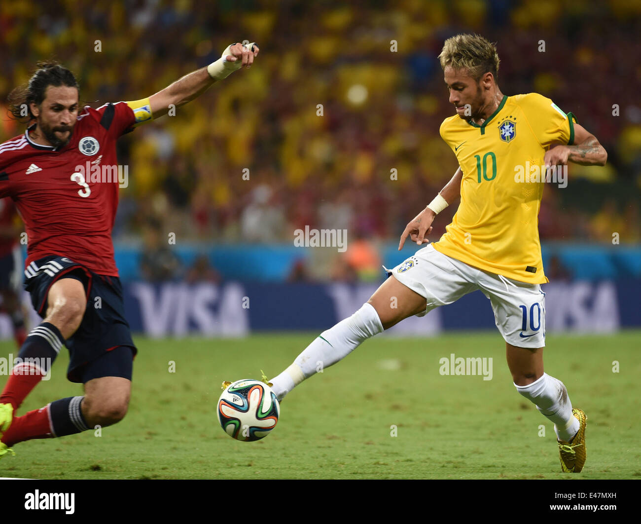 Fortaleza, Brazil. 4th July, 2014. Colombia's Mario Yepes (L) vies with Brazil's Neymar during a quarter-finals match between Brazil and Colombia of 2014 FIFA World Cup at the Estadio Castelao Stadium in Fortaleza, Brazil, on July 4, 2014. Credit:  Li Ga/Xinhua/Alamy Live News Stock Photo