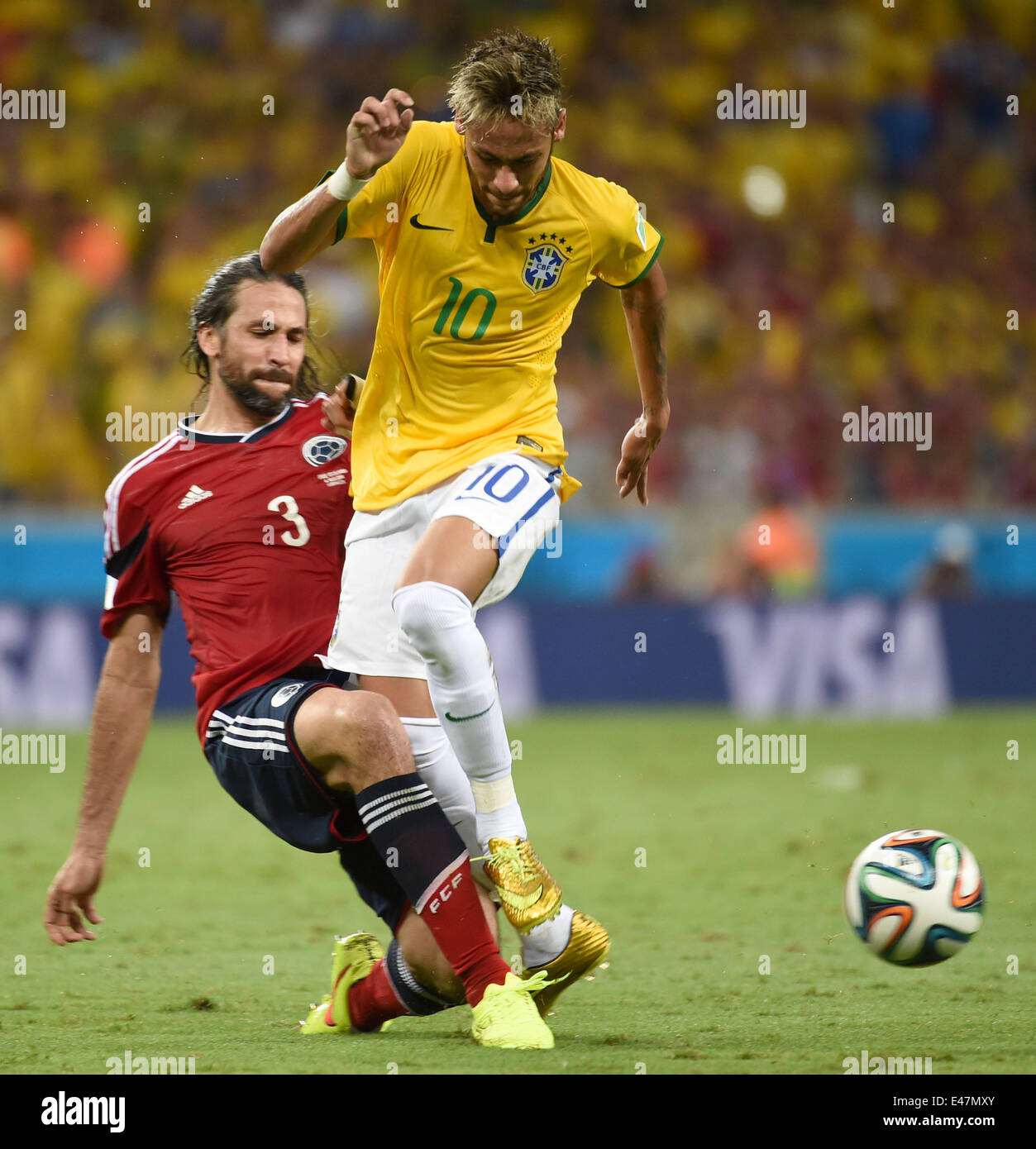 Fortaleza, Brazil. 4th July, 2014. Brazil's Neymar (R) vies with Colombia's Mario Yepes during a quarter-finals match between Brazil and Colombia of 2014 FIFA World Cup at the Estadio Castelao Stadium in Fortaleza, Brazil, on July 4, 2014. Credit:  Li Ga/Xinhua/Alamy Live News Stock Photo
