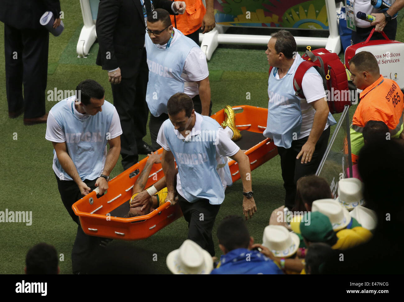 Fortaleza, Brazil. 4th July, 2014. Brazil's Neymar is carried out of the field by medical team during a quarter-finals match between Brazil and Colombia of 2014 FIFA World Cup at the Estadio Castelao Stadium in Fortaleza, Brazil, on July 4, 2014. Brazil won 2-1 over Colombia and qualified for semi-finals on Friday. Credit:  Liao Yujie/Xinhua/Alamy Live News Stock Photo