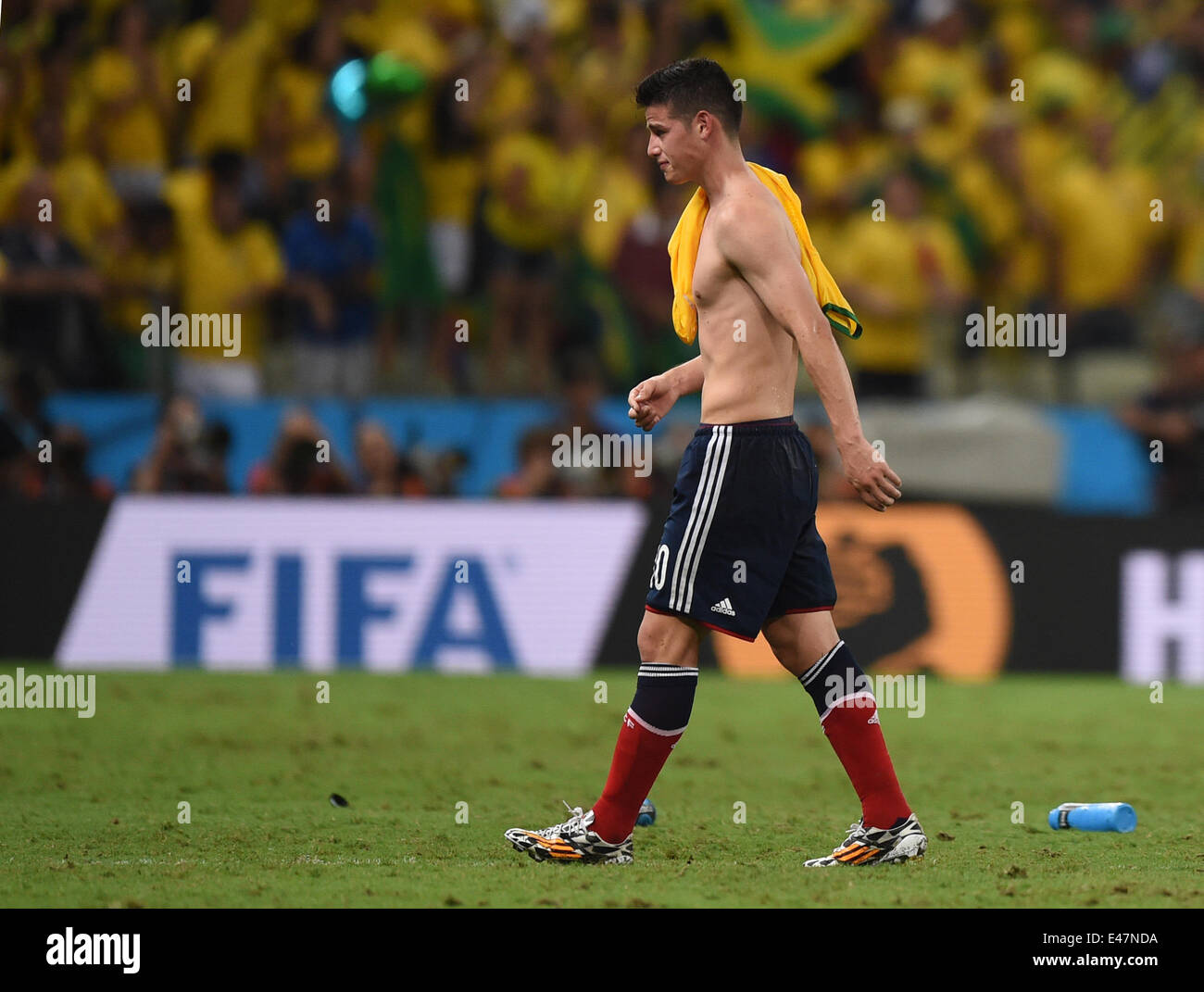 Fortaleza, Brazil. 04th July, 2014. James Rodriguez of Colombia leaves the pitch after the FIFA World Cup 2014 quarter final match soccer between Brazil and Colombia at the Estadio Castelao in Fortaleza, Brazil, 04 July 2014. Photo: Marius Becker/dpa/Alamy Live News Stock Photo