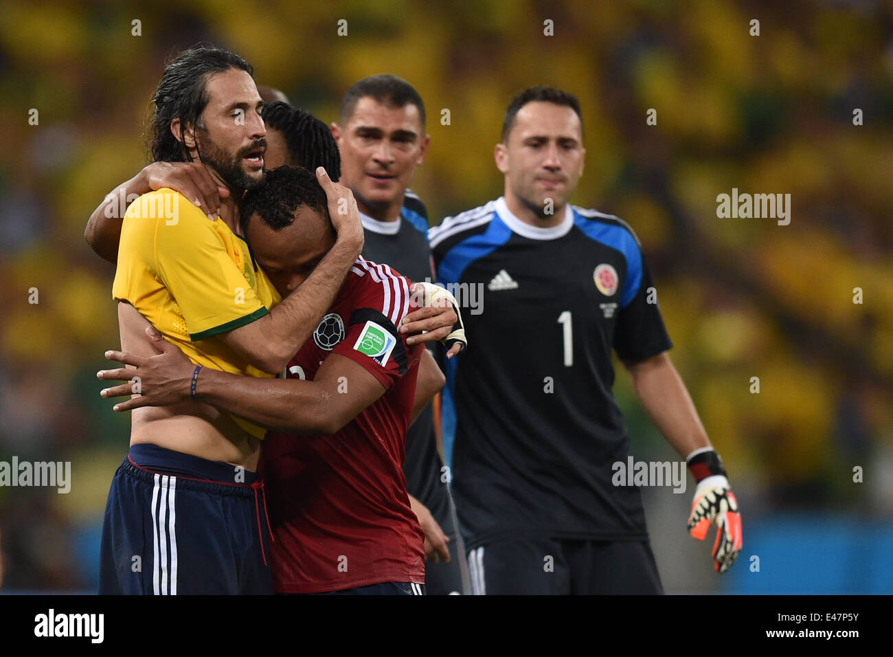 Fortaleza, Brazil. 04th July, 2014. Mario Yepes (L-R), Juan Zuniga and goalkeeper David Ospina of Colombia react after the FIFA World Cup 2014 quarter final match soccer between Brazil and Colombia at the Estadio Castelao in Fortaleza, Brazil, 04 July 2014. Photo: Marius Becker/dpa/Alamy Live News Stock Photo