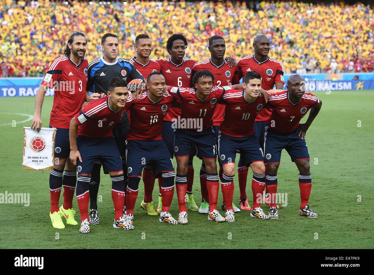 Fortaleza, Brazil. 04th July, 2014. Colombia's starting eleven (top L-R) Mario Yepes, goalkeeper David Ospina, Fredy Guarin, Carlos Sanchez, Pablo Armero, Victor Ibarbo, (bottom L-R) Teofilo Teo Gutierrez, Juan Zuniga, Juan Cuadrado, James Rodriguez, and Cristian Zapata pose for the group photo prior to the FIFA World Cup 2014 quarter final match soccer between Brazil and Colombia at the Estadio Castelao in Fortaleza, Brazil, 04 July 2014. Photo: Marius Becker/dpa/Alamy Live News Stock Photo