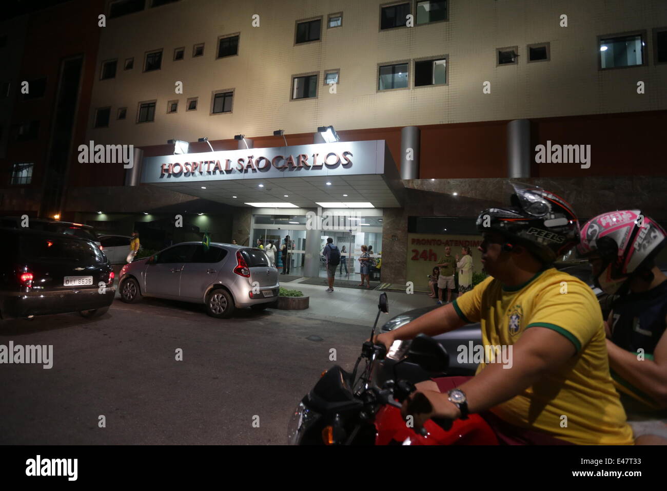 Fortaleza, Brazil. 4th July, 2014. Vehicles traveled in front of the hospital in which Brazil's Neymar is hospitalized after the quarterfinal match between Brazil and Colombia of 2014 Brazil FIFA World Cup, in Fortaleza, Brazil, on July 4, 2014. Team doctor Rodrigo Lasmar said Neymar fractured his third vertebra when he was kneed in the back by Colombia defender Juan Camilo Zuniga. Brazil has shown grit under the intense pressure of home expectation. But getting past its next opponent Germany will be a big task without the genius of Neymar. Credit:  AGENCIA ESTADO/Xinhua/Alamy Live News Stock Photo