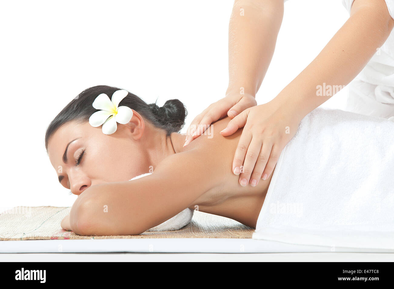 portrait of young beautiful woman massage on white back Stock Photo