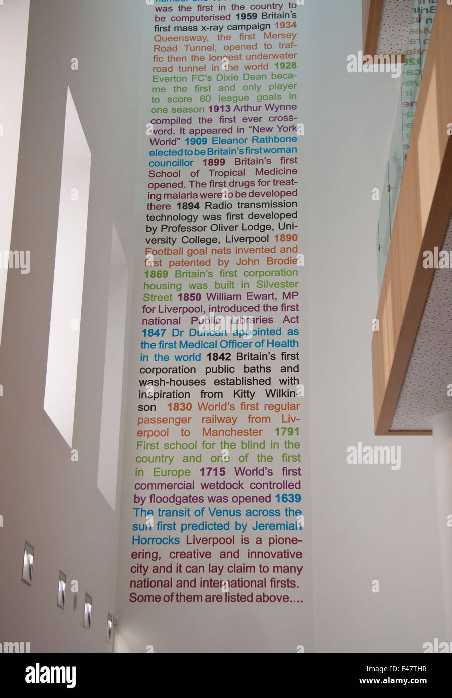 Floor to ceiling list of 'Liverpool Firsts' at Liverpool Central Library, Merseyside, UK.  The library was opened in 2013. Stock Photo