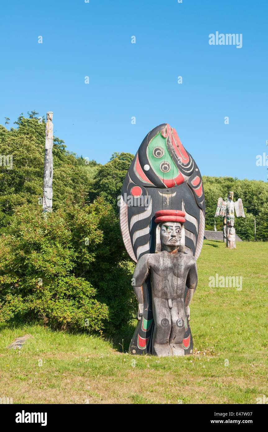 First Nation native totems totem story monument poles in cemetery in