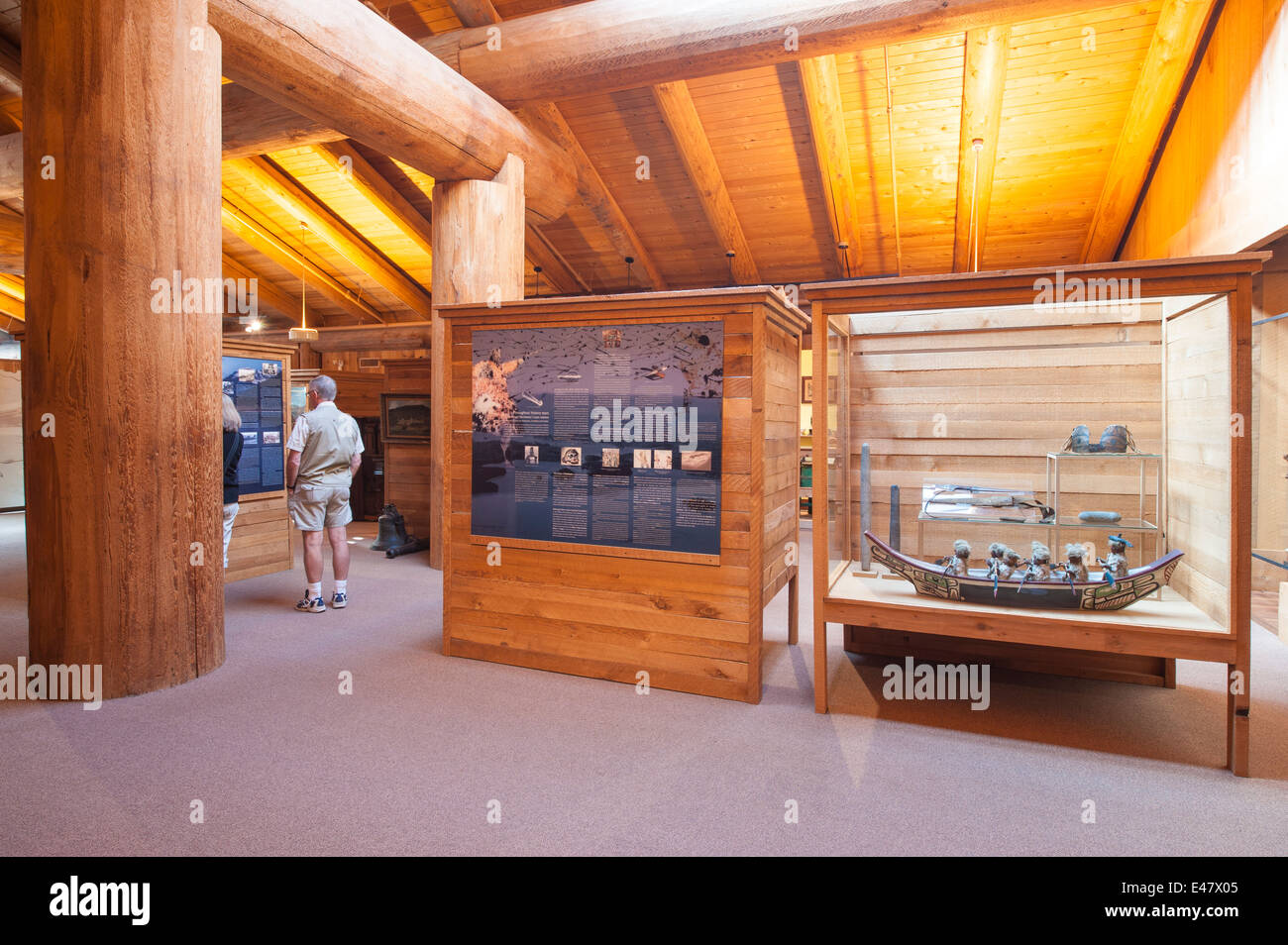 Visitors viewing First nation indian haida coastal people exhibits Museum of Northern British Columbia, Prince Rupert, Canada. Stock Photo