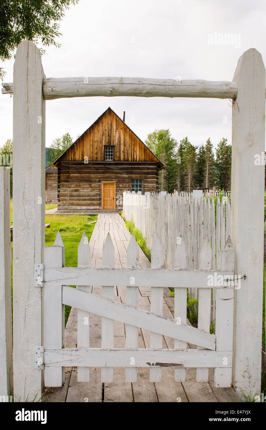 Old log cabin house building and fence gate, Fort Saint St James