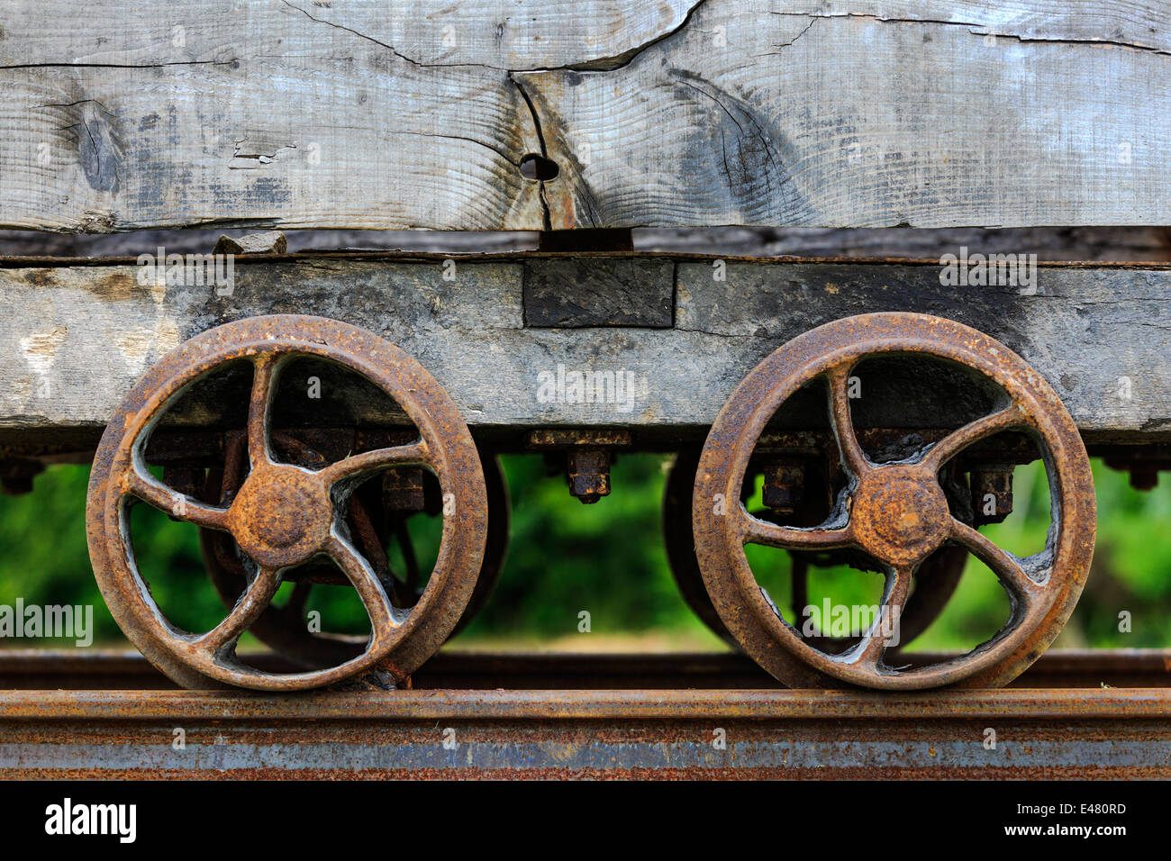 Two rusting wheels on an old and disused mining carriage, Auchinleck, Ayrshire,Scotland, UK Stock Photo