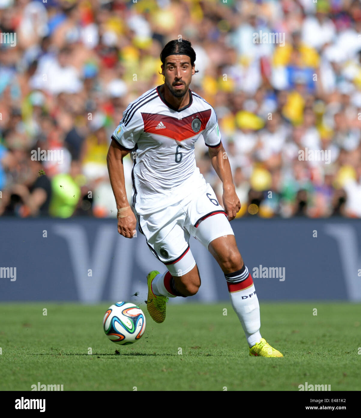 Sami Khedira of Germany controls the ball during the FIFA World Cup 2014 quarter final soccer match between France and Germany at Estadio do Maracana in Rio de Janeiro, Brazil, 04 July 2014. Photo: Thomas Eisenhuth/dpa (RESTRICTIONS APPLY: Editorial Use Only, not used in association with any commercial entity - Images must not be used in any form of alert service or push service of any kind including via mobile alert services, downloads to mobile devices or MMS messaging - Images must appear as still images and must not emulate match action video footage - No alteration is made to, and no text Stock Photo