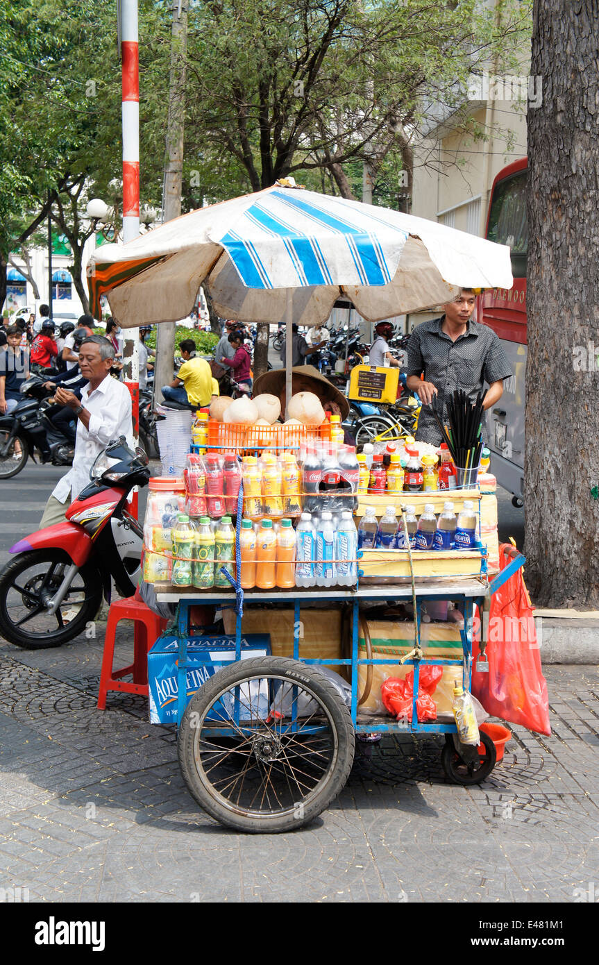 hawker selling bottled drinks in Ho Chi Minh city, Vietnam Stock Photo