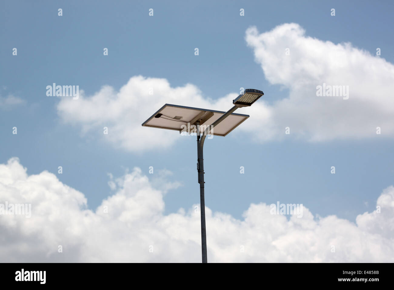 Solar Cell Panel and lanterns street on blue sky background. Stock Photo
