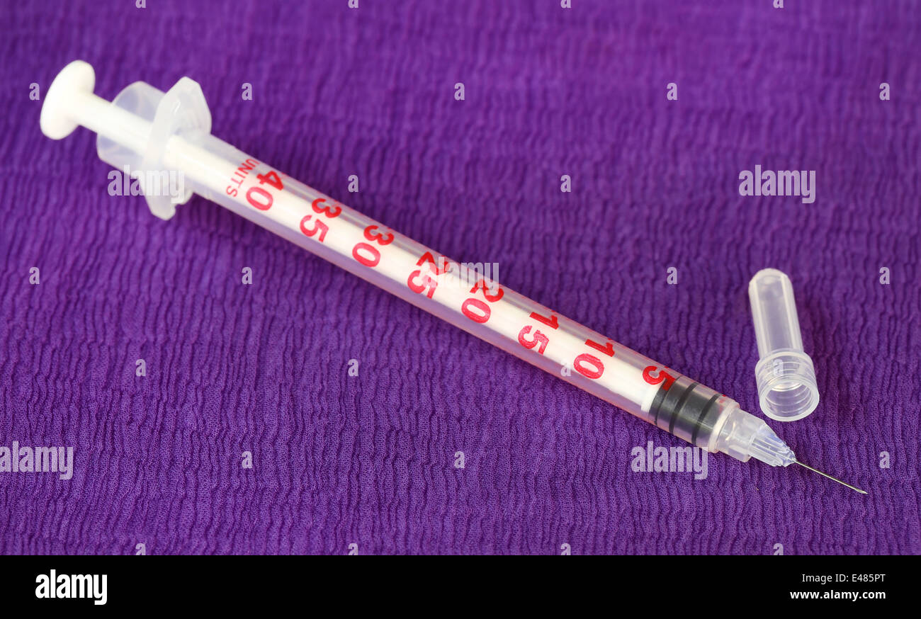 Close up of Hypodermic syringe on cloth Stock Photo Alamy