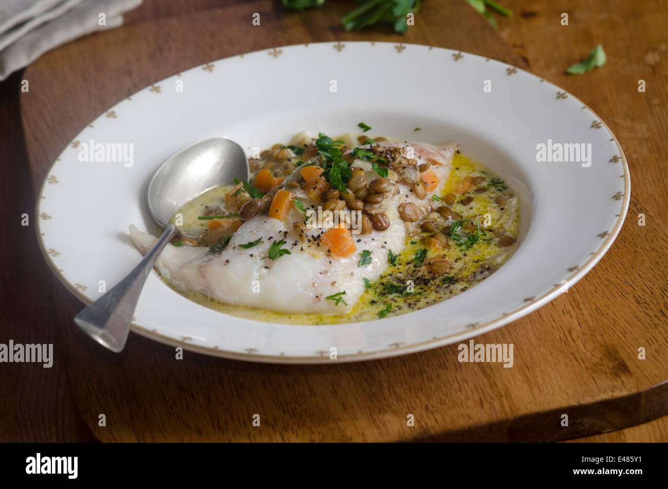 Smoked haddock with lentils Stock Photo Alamy