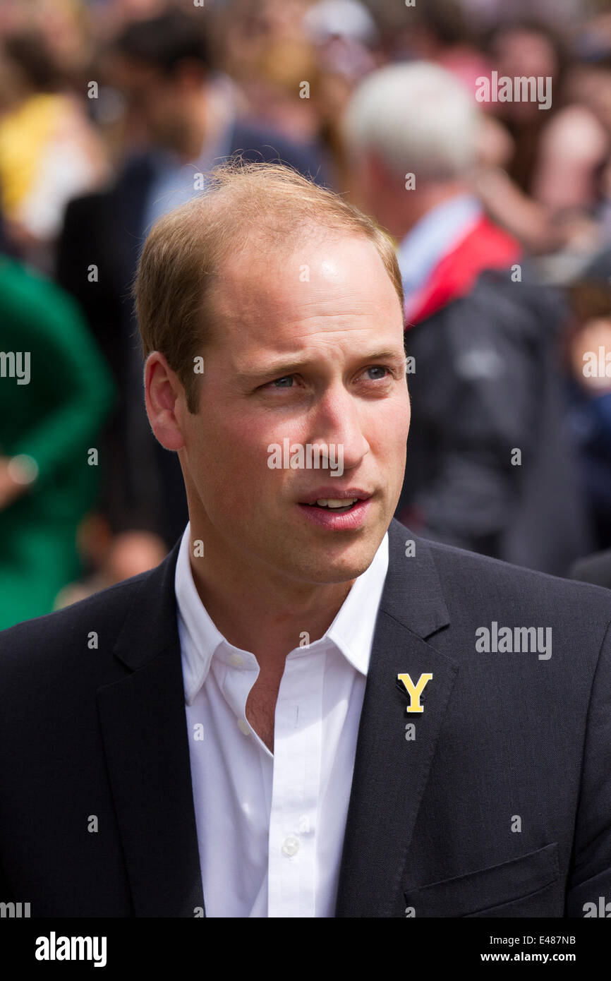 West Tanfield, Yorkshire, UK. 5th July, 2014. The Duke and Duchess of Cambridge, William and Kate, royal walkabout with visit to the village prior to the arrival of the of the Tour de France peloton. The village has especially embraced the “Le Grand Depart, and hosted a fanzone, food and crafts fair, and market stalls celebrating with a new beer –Tour de Ale. The Tour de France is the largest annual sporting event in the world. It is the first time Le Tour has visited the north of England having previously only made visits to the south coast and the capital. Stock Photo