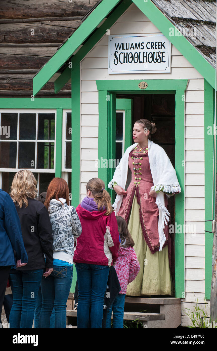 School teacher at schoolhouse reenactment in historic old gold town Barkerville, British Columbia, Canada. Stock Photo