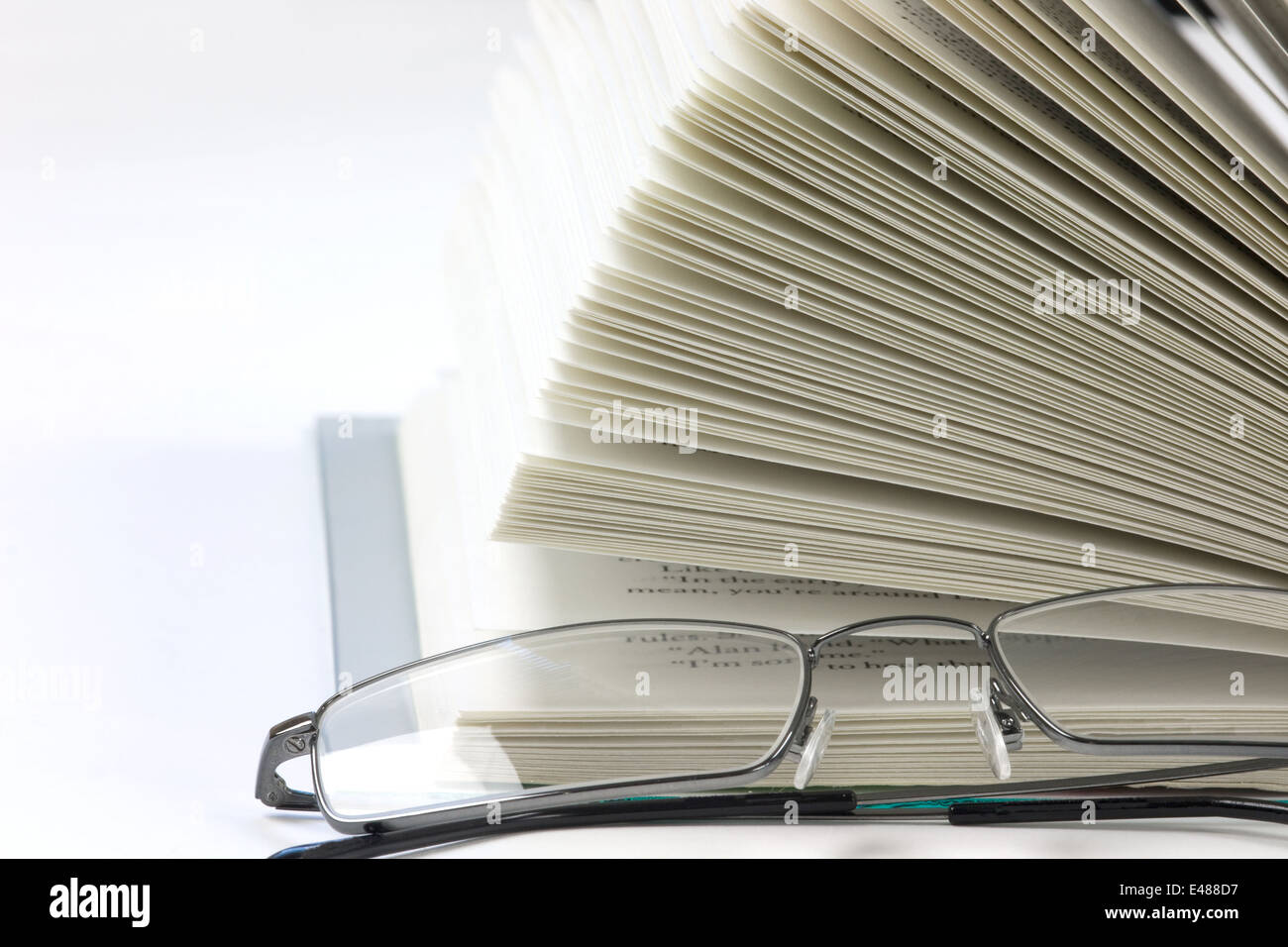 Open book isolated on a white background Stock Photo - Alamy