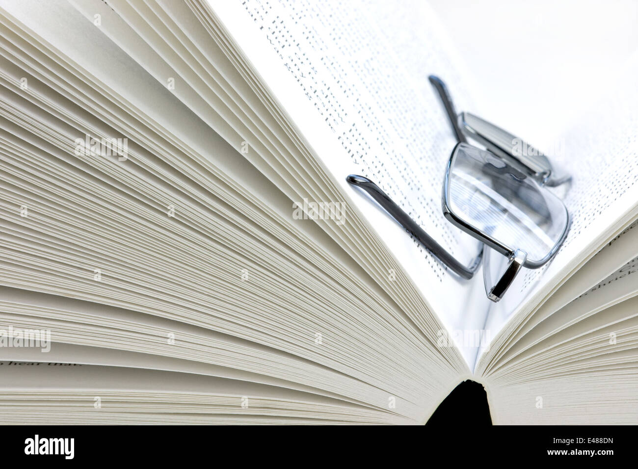 Open book isolated on a white background Stock Photo - Alamy