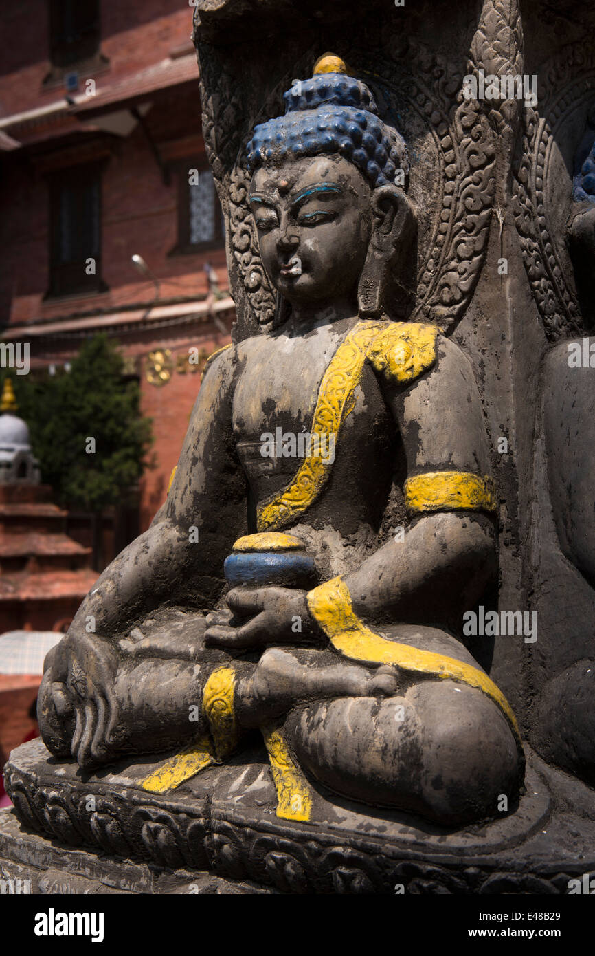 Nepal, Kathmandu, Drubgon Jangchup Choeling black Buddha statue with yellow sash Stock Photo