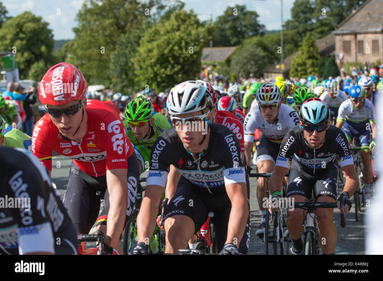 Harrogate, North Yorkshire. 5th July 2014. A tightly packed peleton enters the Yorkshire village of Killinghall, 3 miles from the day one finish in Harrogate. Copyright Ian Wray/Alamy Live News Stock Photo