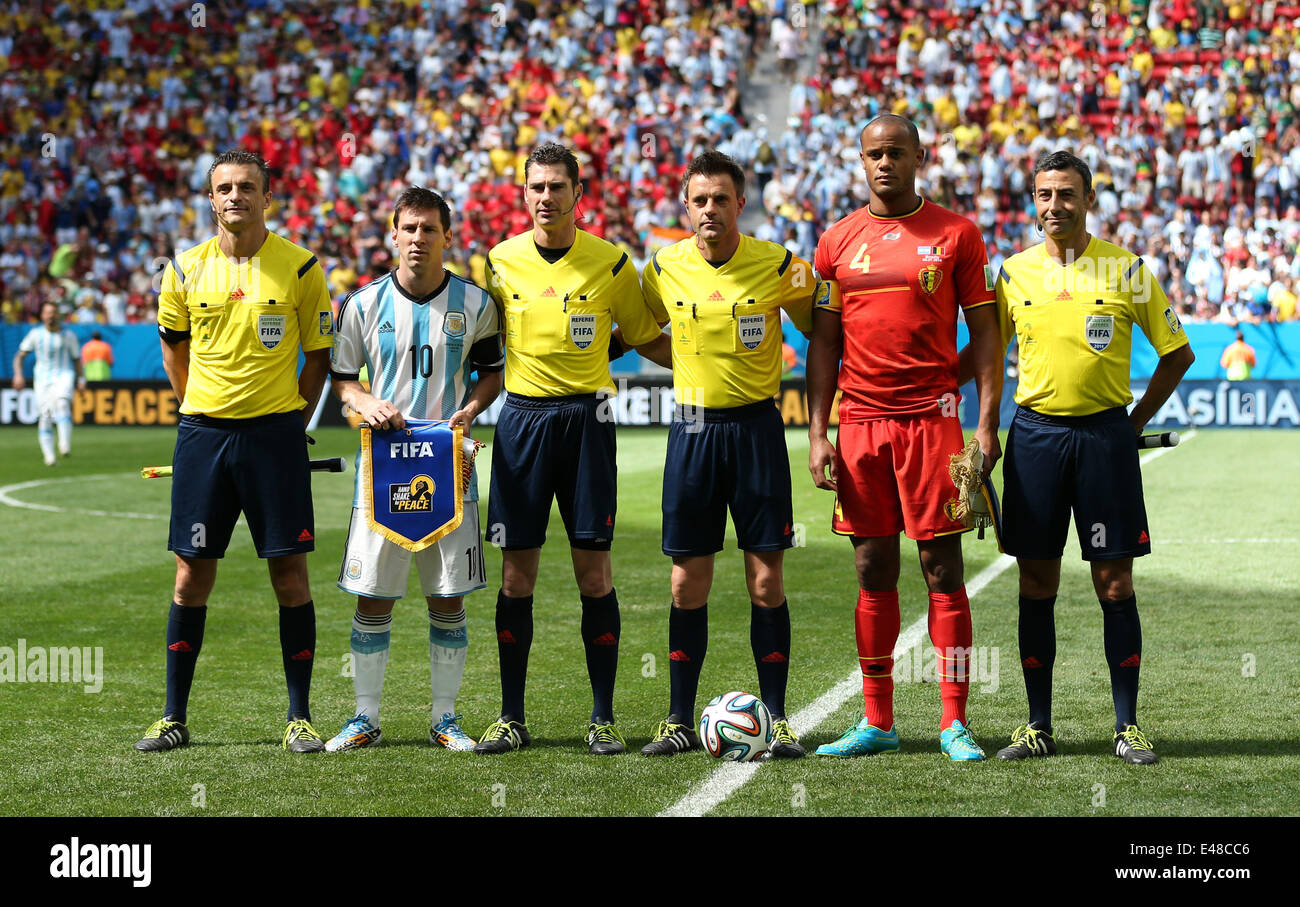 Brasilia, Brazil. 5th July, 2014. Argentina's captain Lionel Messi (2nd L) and Belgium's captain Vincent Kompany (2nd R) pose with the referees prior to a quarter-finals match between Argentina and Belgium of 2014 FIFA World Cup at the Estadio Nacional Stadium in Brasilia, Brazil, on July 5, 2014. Credit:  Liu Bin/Xinhua/Alamy Live News Stock Photo