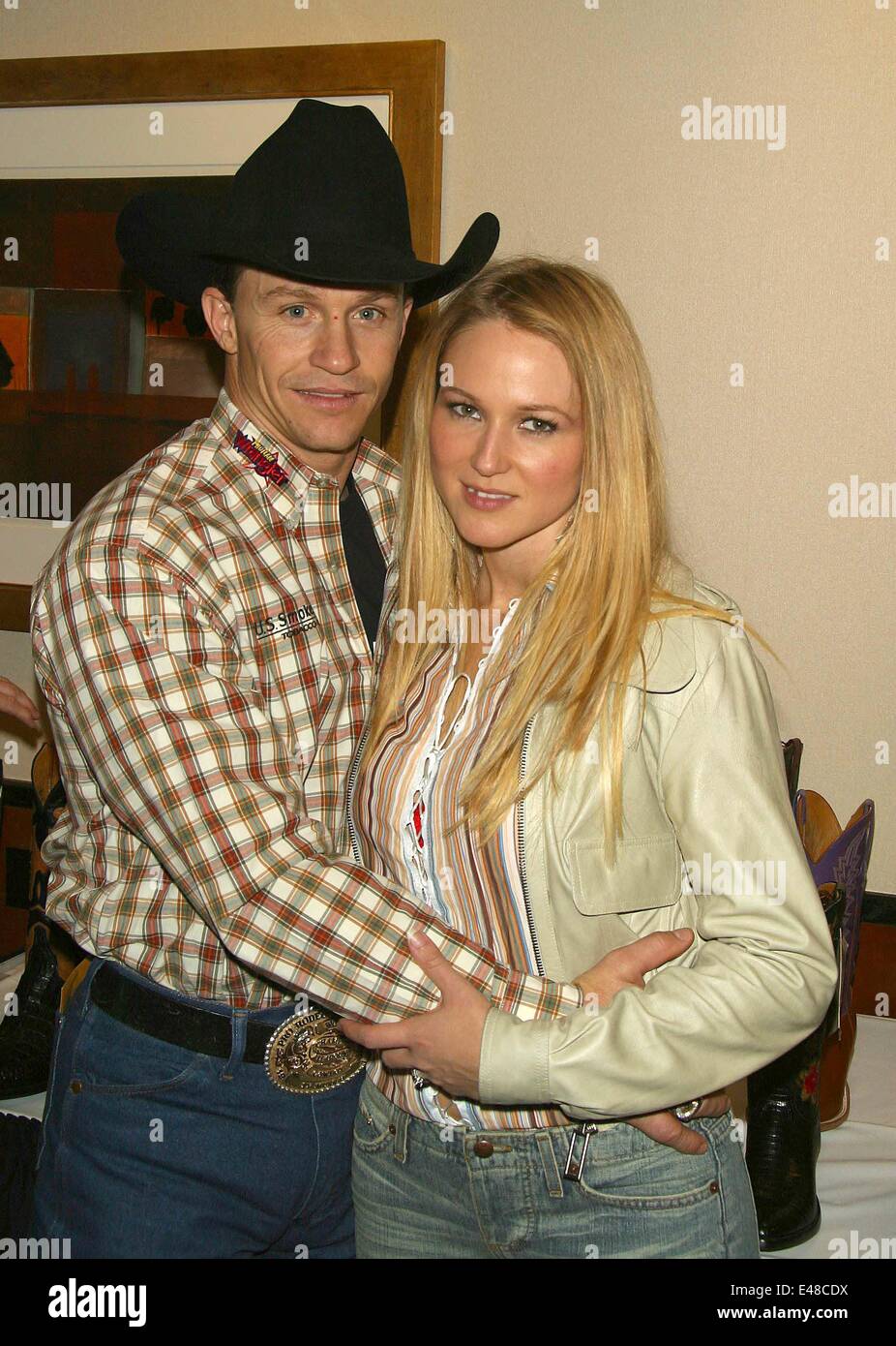 July 2, 2014 - Singer JEWEL and her rodeo cowboy husband TY MURRAY are divorcing after 16 years. The 40-year-old singer, who married the rodeo pro back in August 2008 after 10 years together, announced the split on her official website. PICTURED - Feb. 15, 2003 - Anaheim, California, U.S. - Jewel and Ty Murray attend Champion Event For The Professional Bull Riders at Arrowhead Pond. (Credit Image: © Globe Photos/ZUMAPRESS.com) Stock Photo