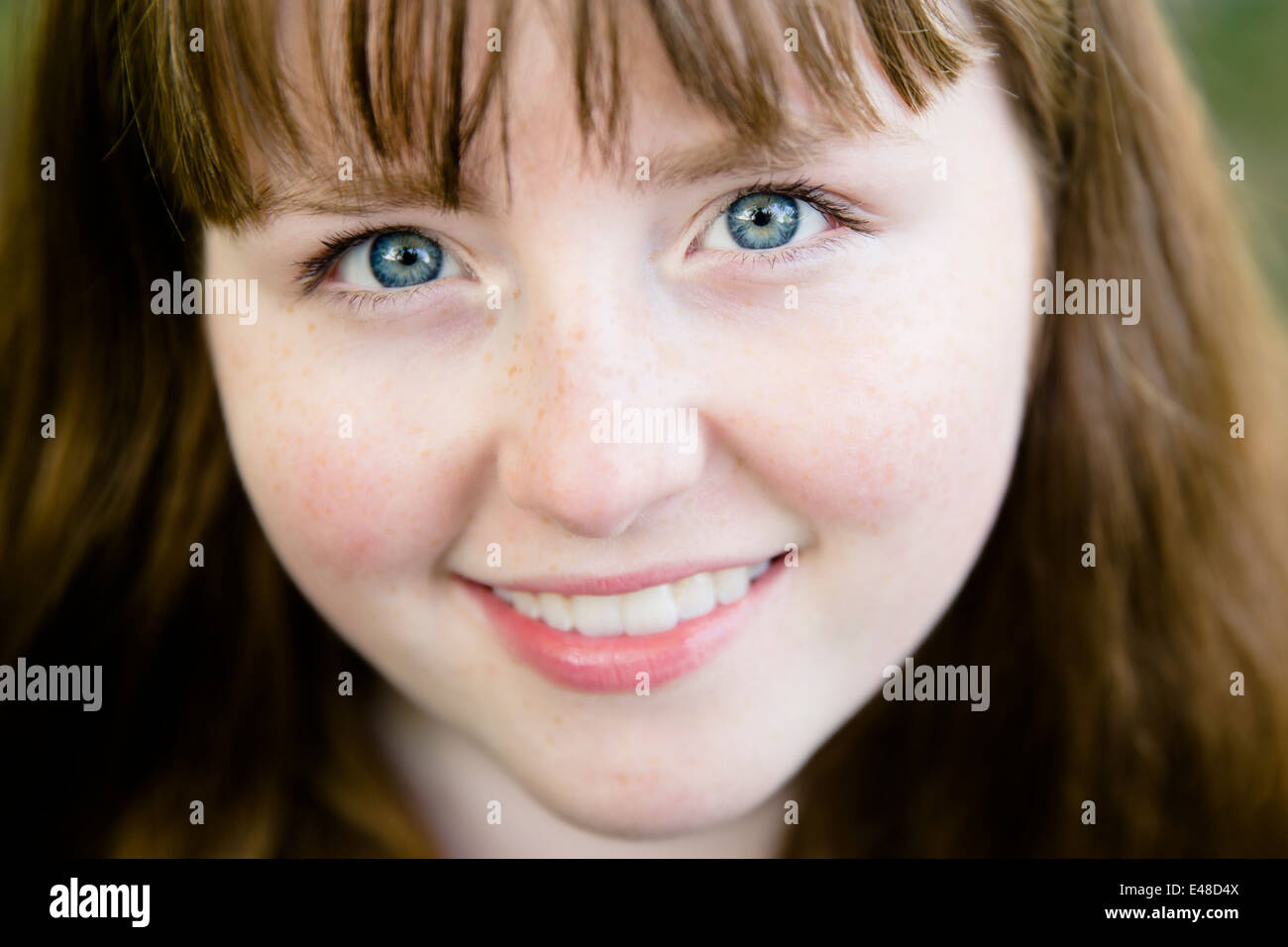 Portrait of smiling girl (13-15) Stock Photo