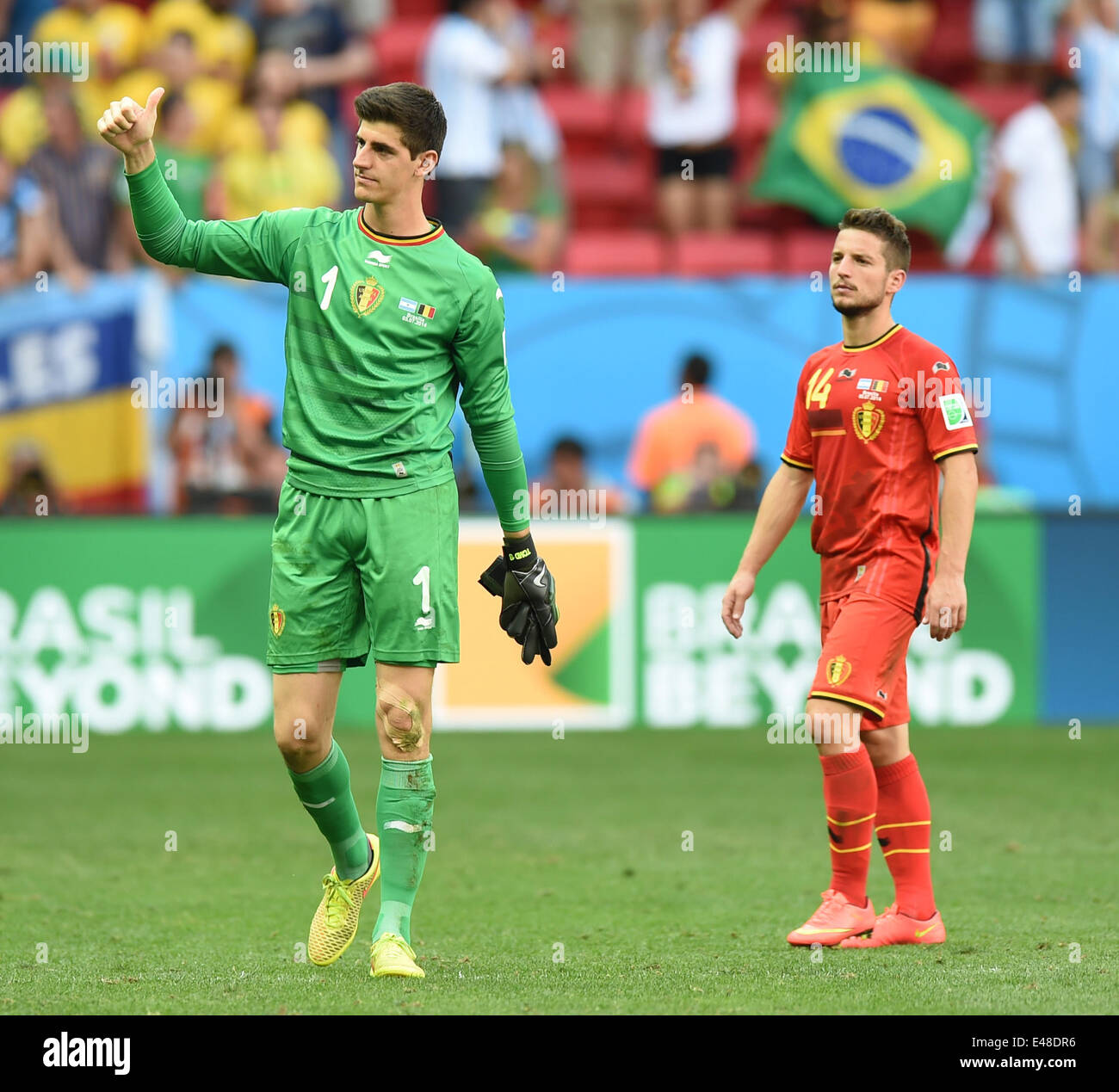 Brasilia, Brazil. 5th July, 2014. Belgium's goalkeeper Thibaut Courtois (L) and Dries Mertens react after a quarter-finals match between Argentina and Belgium of 2014 FIFA World Cup at the Estadio Nacional Stadium in Brasilia, Brazil, on July 5, 2014. Argentina won 1-0 over Belgium and qualified for the semi-finals. Credit:  Liu Dawei/Xinhua/Alamy Live News Stock Photo