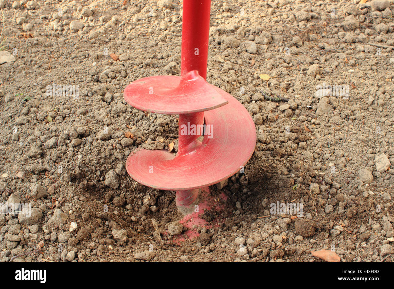 Home tool for drilling holes for wood poles Stock Photo