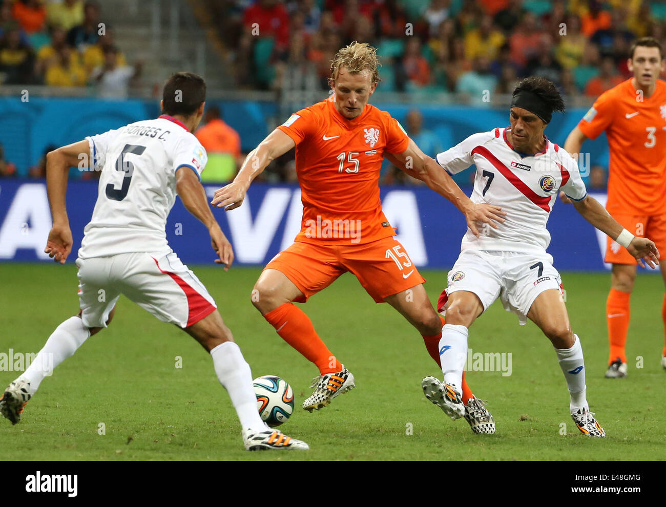Salvador, Brazil. 5th July, 2014. Costa Rica's Celso Borges (1st L) and Christian Bolanos (3rd L) defend against Netherlands' Dirk Kuyt (2nd L) during a quarter-finals match between Netherlands and Costa Rica of 2014 FIFA World Cup at the Arena Fonte Nova Stadium in Salvador, Brazil, on July 5, 2014. Credit:  Cao Can/Xinhua/Alamy Live News Stock Photo