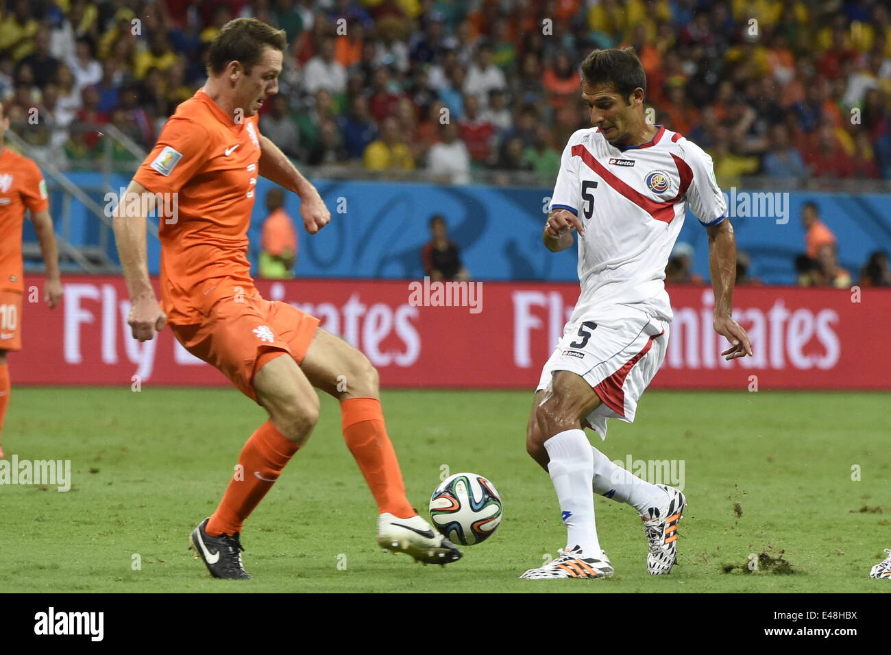 Salvador, Brazil. 5th July, 2014. Netherlands's Stefan de Vrij vies with Costa Rica's Celso Borges during a quarter-finals match between Netherlands and Costa Rica of 2014 FIFA World Cup at the Arena Fonte Nova Stadium in Salvador, Brazil, on July 5, 2014. Credit:  Lui Siu Wai/Xinhua/Alamy Live News Stock Photo