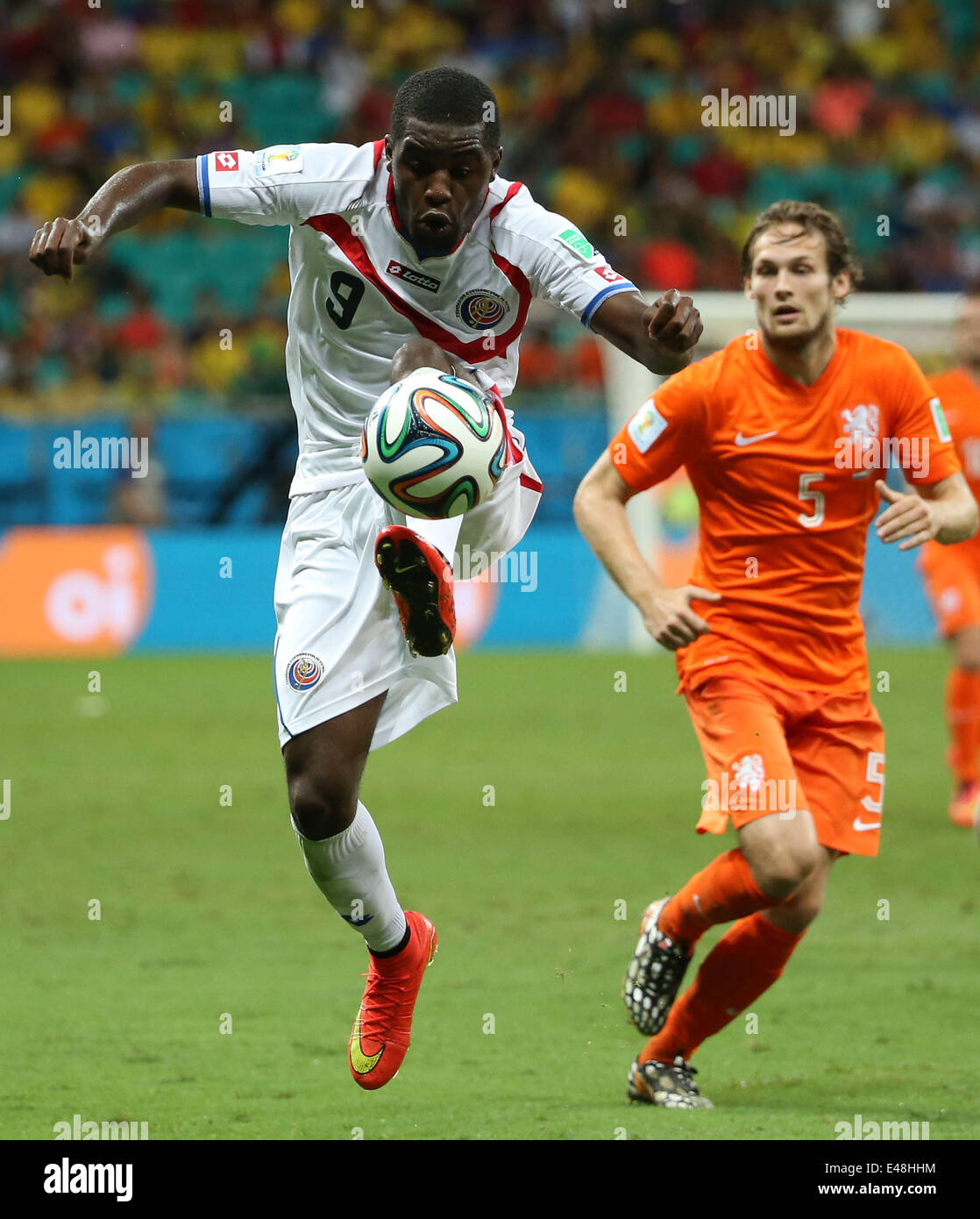 Salvador, Brazil. 5th July, 2014. Costa Rica's Joel Campbell (front) controls the ball during a quarter-finals match between Netherlands and Costa Rica of 2014 FIFA World Cup at the Arena Fonte Nova Stadium in Salvador, Brazil, on July 5, 2014. Credit:  Cao Can/Xinhua/Alamy Live News Stock Photo
