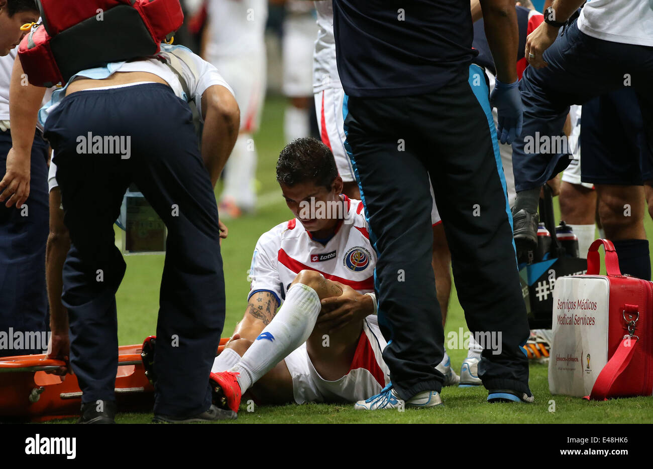 Salvador, Brazil. 5th July, 2014. Costa Rica's Christian Gamboa receives medical treatment during a quarter-finals match between Netherlands and Costa Rica of 2014 FIFA World Cup at the Arena Fonte Nova Stadium in Salvador, Brazil, on July 5, 2014. Credit:  Cao Can/Xinhua/Alamy Live News Stock Photo