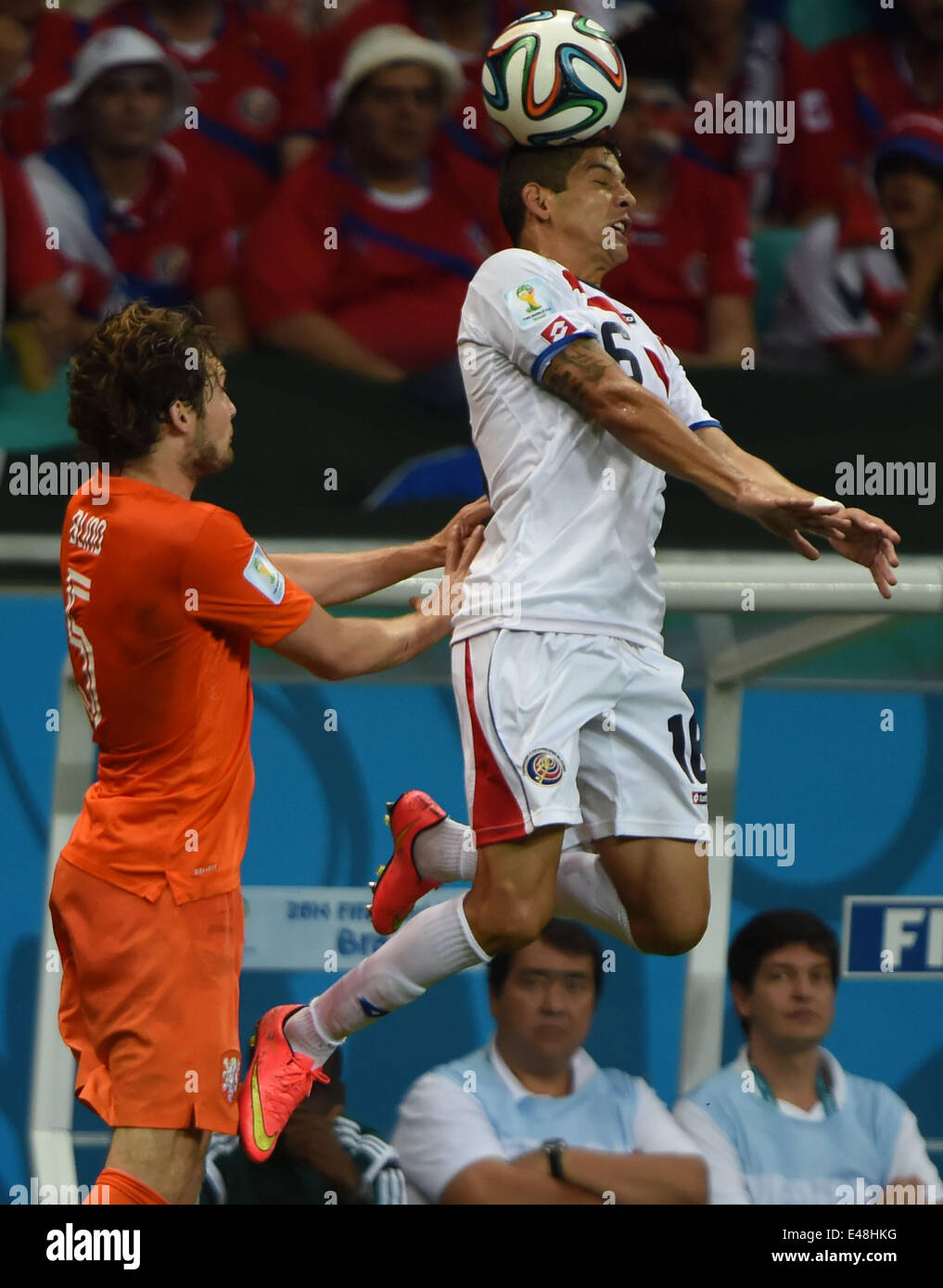Salvador, Brazil. 5th July, 2014. Costa Rica's Christian Gamboa (up) heads the ball during a quarter-finals match between Netherlands and Costa Rica of 2014 FIFA World Cup at the Arena Fonte Nova Stadium in Salvador, Brazil, on July 5, 2014. Credit:  Guo Yong/Xinhua/Alamy Live News Stock Photo