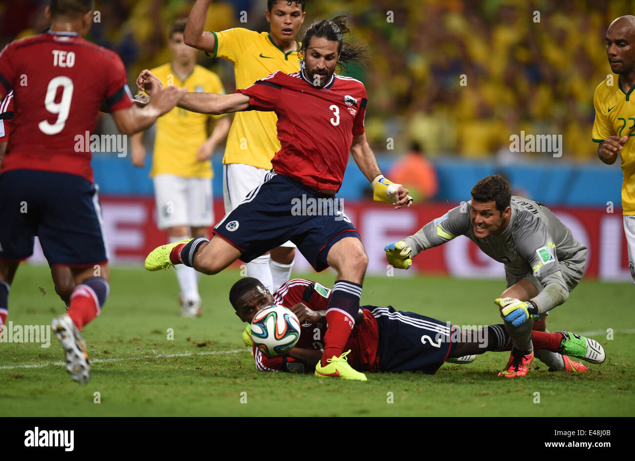 Fortaleza, Brazil. 04th July, 2014. Goalkeeper Julio Cesar (R) of Brazil watches as Mario Yepes (C) of Colombia scores but is ruled out for offside during the FIFA World Cup 2014 quarter final match soccer between Brazil and Colombia at the Estadio Castelao in Fortaleza, Brazil, 04 July 2014. Credit:  Action Plus Sports/Alamy Live News Stock Photo