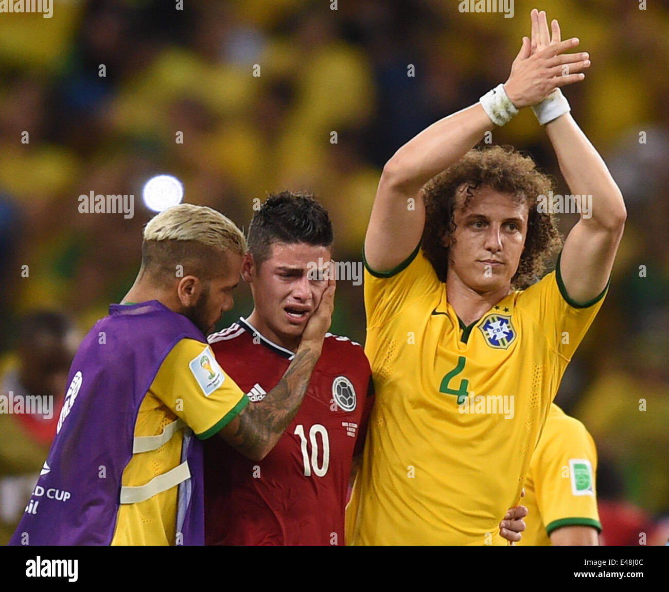 004.07.2014. Fortaleza, Brazil. David Luiz of Brazil congratulates the game from James Rodriguez (L) of Colombia after the FIFA World Cup 2014 quarter final match soccer between Brazil and Colombia at the Estadio Castelao in Fortaleza, Brazil, 04 July 2014. Stock Photo