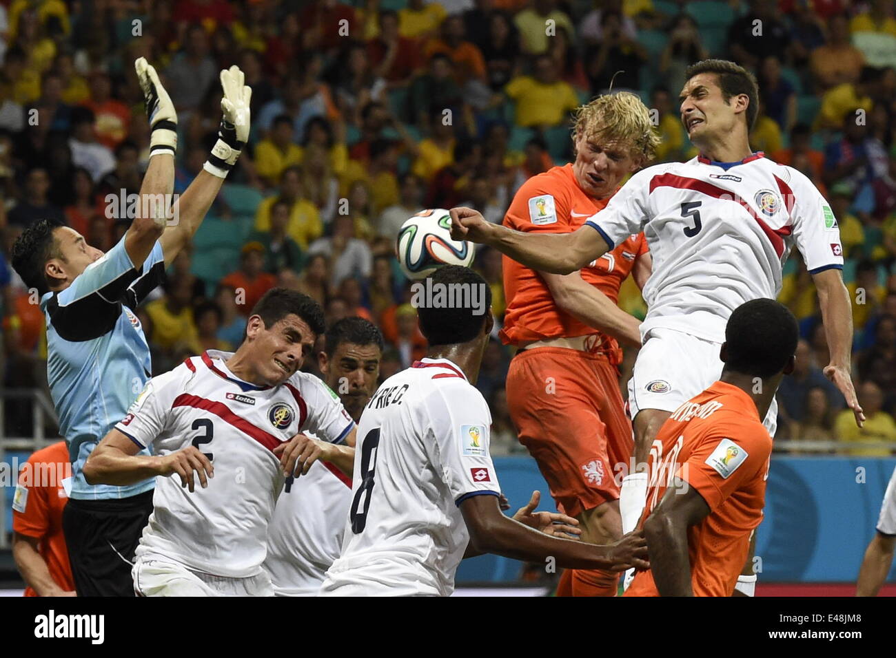 Salvador, Brazil. 5th July, 2014. Netherlands's Dirk Kuyt (3rd R) vies with Costa Rica's Johnny Acosta (No.2), Heiner Mora (No.8) and Celso Borges (No.5) during the extra time of a quarter-finals match between Netherlands and Costa Rica of 2014 FIFA World Cup at the Arena Fonte Nova Stadium in Salvador, Brazil, on July 5, 2014. Netherlands won 4-3 on penalties over Costa Rica after a 0-0 tie and qualified for semi-finals on Saturday. Credit:  Lui Siu Wai/Xinhua/Alamy Live News Stock Photo