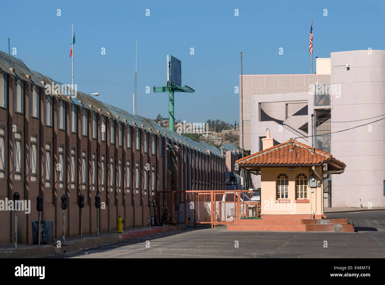 US border wall near official entry crossing in downtown Nogales Arizona USA Stock Photo