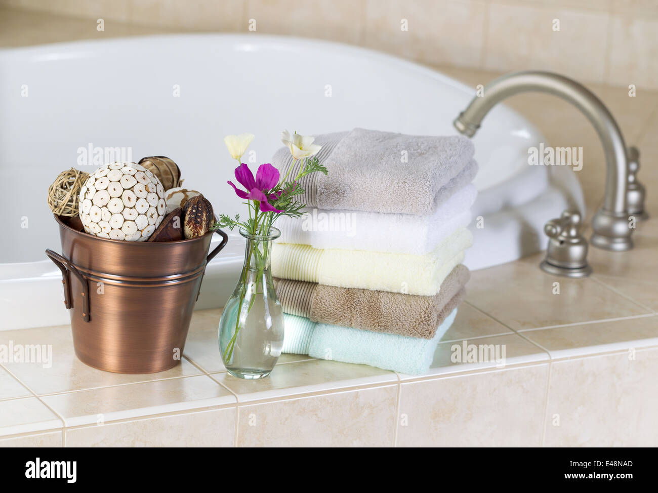 Relaxing soaking tub and spa accessories Stock Photo