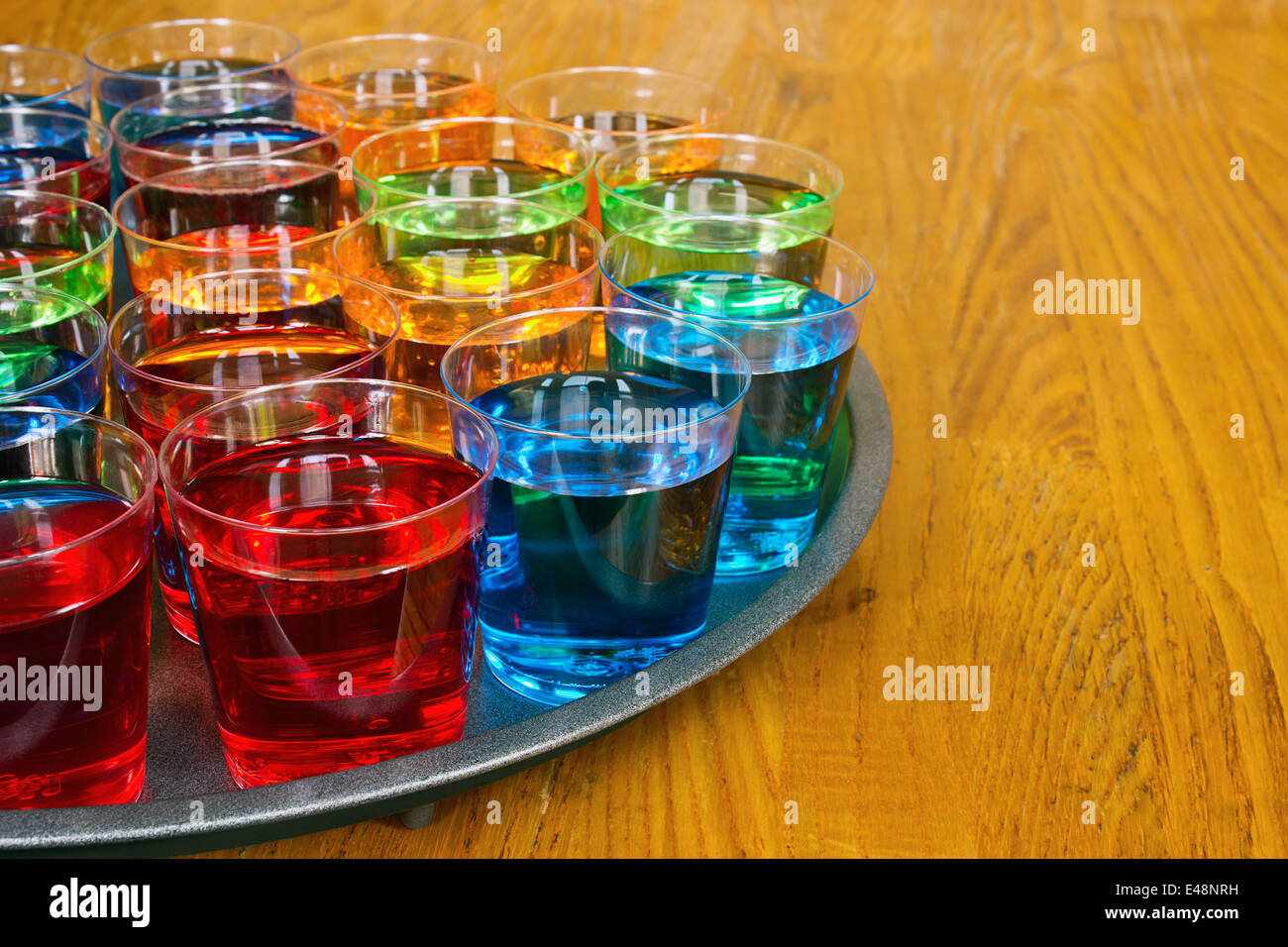 Drinks promotion with various shots on a tray to test as samplers or tasters for merchandising in the drinks industry. Stock Photo