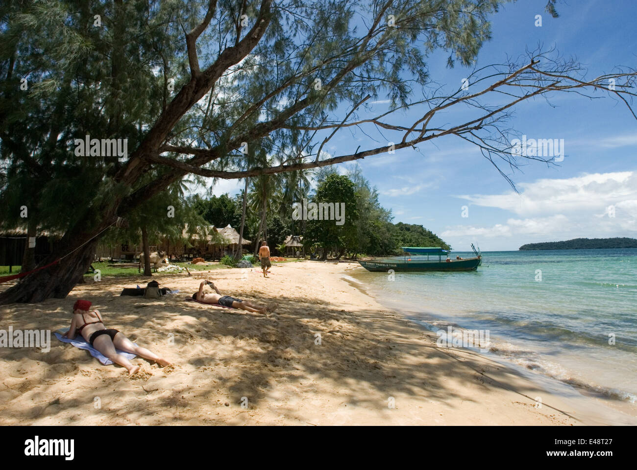 Beach on the island of Koh Russei. Koh Russei, also named Koh Russey or Bamboo Island is a green, gilt-edged crescent, resting o Stock Photo