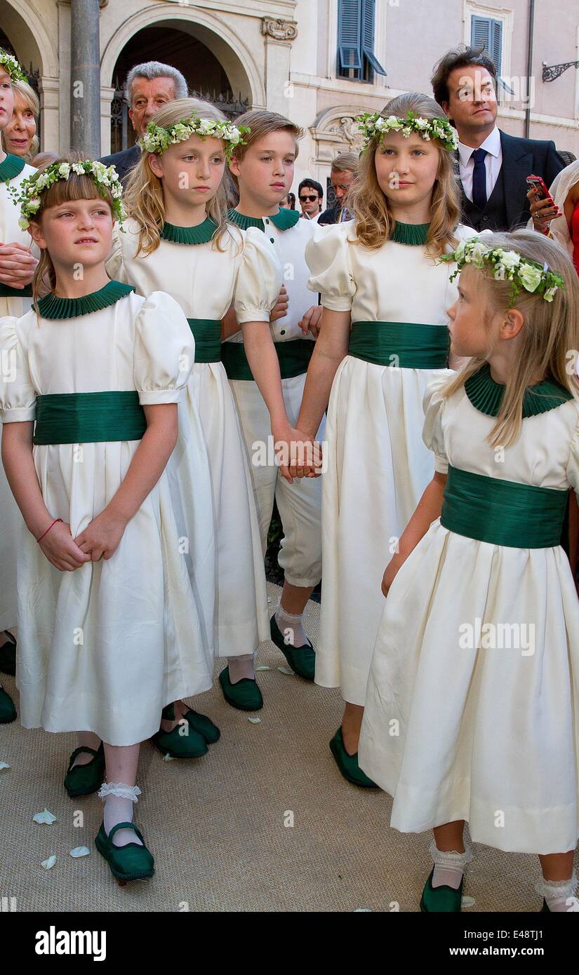 Belgian Prince Laurent (L) is pictured with Princess Claire (R) and her  daughter Princess Louise on the podium during the military parade on the  occasion of Belgium?s National Day in Brussels, Belgium