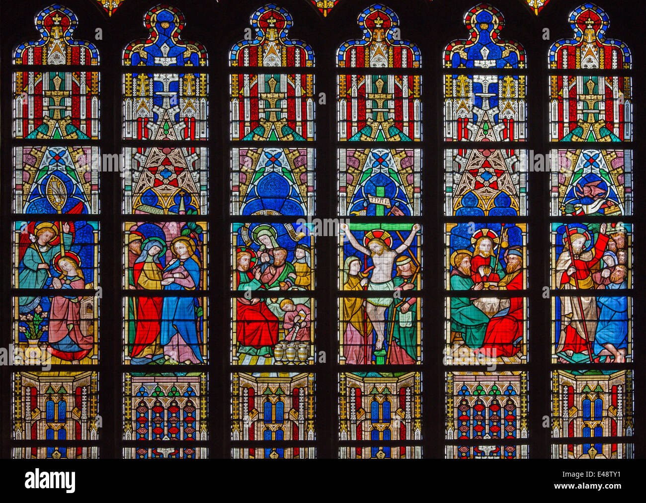 BRUGES, BELGIUM - JUNE 12, 2014: The New Testament scenes on windowpane in St. Salvator's Cathedral (Salvatorskerk) Stock Photo