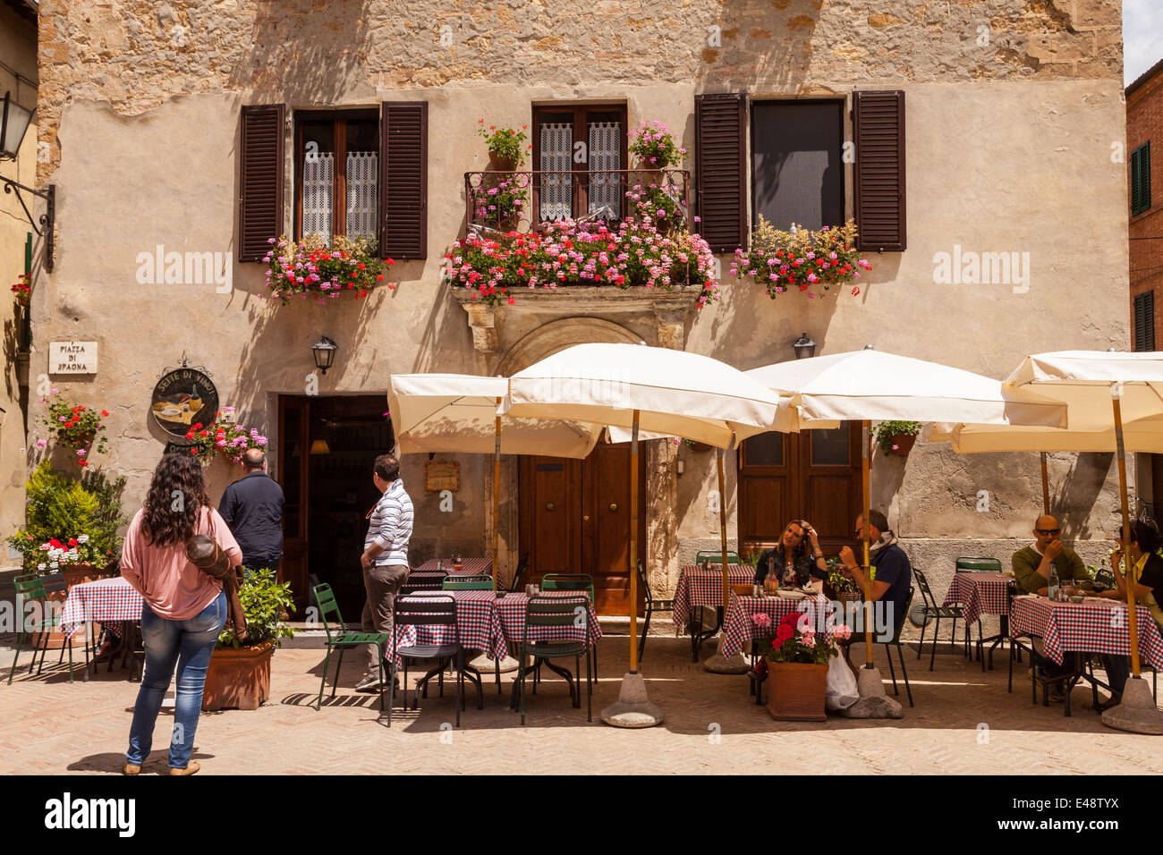 A restaurant in Piazza di Spagna, Pienza, Tuscany. The town was declared a World Heritage Site by UNESCO in 1996. Stock Photo